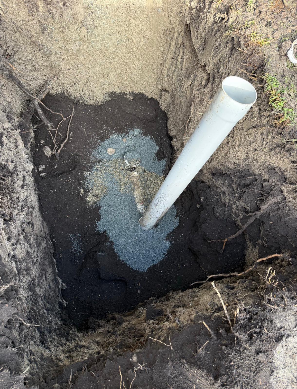 Excavated pit showing new PVC drain pipe being installed Mill Park Melbourne